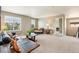 Upstairs loft area with lots of natural light and comfortable furnishings at 4920 S Netherland Way, Centennial, CO 80015