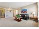 Upstairs loft with sofa, southwest artwork, and two doorways at 4920 S Netherland Way, Centennial, CO 80015
