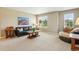 Cozy loft area with a sofa, comfortable chair and view of the neighborhood at 4920 S Netherland Way, Centennial, CO 80015