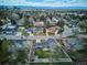 Single-Gathering home situated in a serene, tree-lined neighborhood with lush greenery and well-manicured lawns at 4358 S Alton St, Greenwood Village, CO 80111