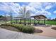 Picnic area with shaded tables and lush greenery for a relaxing outdoor dining experience at 4358 S Alton St, Greenwood Village, CO 80111