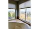 This bathroom view showcases a corner tub, large windows and stunning countryside view at 9407 E 147Th Pl, Brighton, CO 80602