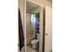 Small bathroom with a combined shower and bath and a ladder-style shelf at 9407 E 147Th Pl, Brighton, CO 80602