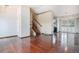 Spacious living room boasts hardwood floors and staircase access at 1947 S Ouray St, Aurora, CO 80013