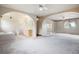 Large main bedroom featuring two ceiling fans and an ensuite bath at 1947 S Ouray St, Aurora, CO 80013