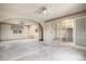 Large main bedroom featuring two ceiling fans, ensuite bath, and walk-in closet at 1947 S Ouray St, Aurora, CO 80013