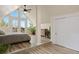 Bedroom with wood floors, walkout balcony and nice decor at 24 Navajo Trl, Evergreen, CO 80439