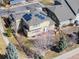 An aerial shot showcasing the backyard, solar panels, and neighborhood surroundings, highlighting the property's location at 6690 S Fenton St, Littleton, CO 80123