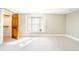 Bedroom featuring neutral colored walls, plush carpet, and a bay window at 433 N Ogden St, Denver, CO 80218