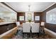 Elegant dining room with hardwood floors, stylish chairs, and natural light at 433 N Ogden St, Denver, CO 80218