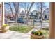 View from the porch overlooking the well-manicured front yard and neighborhood at 433 N Ogden St, Denver, CO 80218