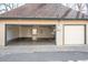 Spacious two car garage featuring an adjacent workshop, perfect for projects, providing ample space at 433 N Ogden St, Denver, CO 80218