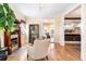 Spacious living room with hardwood floors, a fireplace, comfortable seating, and an open layout at 433 N Ogden St, Denver, CO 80218