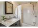 Clean bathroom with a shower/tub combo and marble vanity at 704 E Baseline Rd, Lafayette, CO 80026