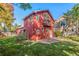 Red two-story house with a patio at 704 E Baseline Rd, Lafayette, CO 80026