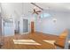 Bright living room featuring hardwood floors and high ceilings at 704 E Baseline Rd, Lafayette, CO 80026