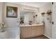 Bright bathroom featuring double sinks, a soaking tub, and tasteful decor for a relaxing experience at 12513 Alcott St, Broomfield, CO 80020
