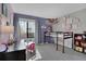 Brightly decorated bedroom featuring a loft bed, play area, and whimsical decorations at 12513 Alcott St, Broomfield, CO 80020