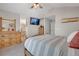 Spacious main bedroom with vaulted ceilings, television, and attached bathroom for extra convenience at 12513 Alcott St, Broomfield, CO 80020