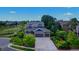Charming two-story home with a stone facade and a three-car garage, situated on a well-manicured lot at 14620 Prairie Sky Ln, Broomfield, CO 80023