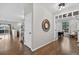 Open foyer featuring hardwood floors and access to multiple rooms through doorways at 14620 Prairie Sky Ln, Broomfield, CO 80023