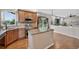 Modern kitchen with stainless steel appliances, granite countertops, and a large island at 14620 Prairie Sky Ln, Broomfield, CO 80023