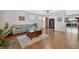 Cozy living room featuring hardwood floors, neutral walls, and stylish decor at 14620 Prairie Sky Ln, Broomfield, CO 80023