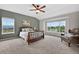 The main bedroom features vaulted ceilings and two large windows that bring in natural light at 14620 Prairie Sky Ln, Broomfield, CO 80023