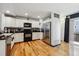 A modern kitchen featuring stainless steel appliances and a convenient design at 8751 Pearl St # J3, Thornton, CO 80229