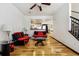 Inviting living room with hardwood floors and modern decor, creating a comfortable and stylish living space at 8751 Pearl St # J3, Thornton, CO 80229