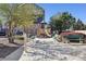 Attractive community playground featuring slides, play structure, and seating with landscaping at 8751 Pearl St # J3, Thornton, CO 80229