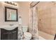 Bathroom with tub, shower, vanity, and tile flooring at 8036 E 53Rd Dr, Denver, CO 80238