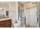 Bathroom with shower, granite vanity, and tile flooring at 8036 E 53Rd Dr, Denver, CO 80238