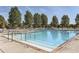 Inviting community pool with ample deck space and lounge chairs at 8036 E 53Rd Dr, Denver, CO 80238