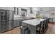 Stylish kitchen has stainless steel appliances and a large island with seating at 2687 E 124Th Pl, Thornton, CO 80241