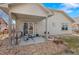 Cozy patio provides a perfect spot for relaxing and enjoying the outdoors at 157 Sand Cherry St, Brighton, CO 80601