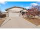 Charming single-Gathering home featuring a two-car garage and welcoming exterior at 157 Sand Cherry St, Brighton, CO 80601