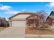 Charming single-Gathering home featuring a two-car garage and welcoming exterior at 157 Sand Cherry St, Brighton, CO 80601