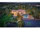 Aerial view of the property showcasing the pool, tennis court, landscaped grounds, and beautiful home at 5 Walden Ln, Cherry Hills Village, CO 80121