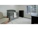 Cozy Bedroom with grey crib, a large window, and light colored walls at 5 Walden Ln, Cherry Hills Village, CO 80121