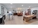 Entertainment area with a table, seating, and a variety of games for the whole Gathering at 5 Walden Ln, Cherry Hills Village, CO 80121