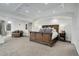 Spacious main bedroom suite featuring wood furniture and a sitting area at 5 Walden Ln, Cherry Hills Village, CO 80121