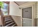 Home entrance with stairs leading up to the front door at 17381 E Mansfield Ave # 711L, Aurora, CO 80013