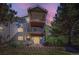Three-story condo with multiple balconies and well-maintained landscaping at 17381 E Mansfield Ave # 711L, Aurora, CO 80013