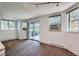 Inviting living space with sliding doors and windows, ensuring bright and airy ambiance for a serene atmosphere at 17381 E Mansfield Ave # 711L, Aurora, CO 80013