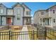 Charming two-story home with grey siding, a welcoming porch with seating, and a well-maintained front yard at 18059 French Creek Ave, Parker, CO 80134