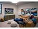 Finished basement featuring a large TV, comfortable seating, and unique artwork at 208 N Ridge St, Breckenridge, CO 80424