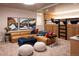Finished basement with a comfortable seating area, bunk beds, and stylish decor at 208 N Ridge St, Breckenridge, CO 80424