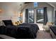 Comfortable bedroom with a plush bed, mountain views, and stylish decor at 208 N Ridge St, Breckenridge, CO 80424