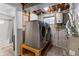 Functional laundry area with a modern washer and dryer set, along with essential utilities and ample workspace at 20908 E Dorado Cir, Centennial, CO 80015